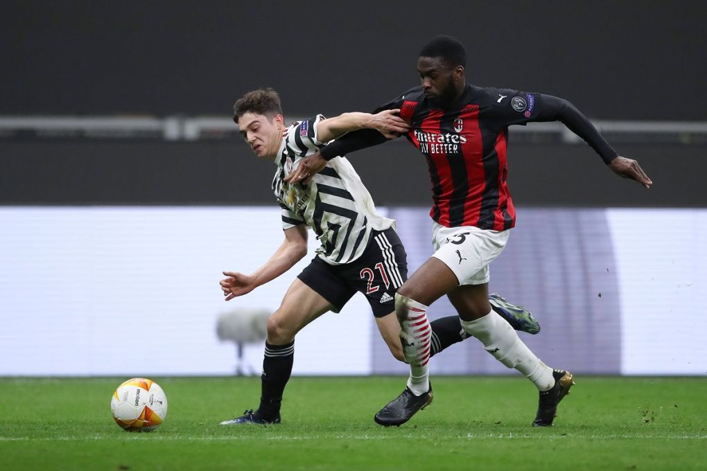 Fikayo Tomori of AC Milan tussles with Daniel James of Manchester United, ManU during the UEFA Europa League match at Giuseppe Meazza, Milan. Picture date: 18th March 2021. Picture credit should read: Jonathan Moscrop/Sportimage PUBLICATIONxNOTxINxUK SPI-0961-0040