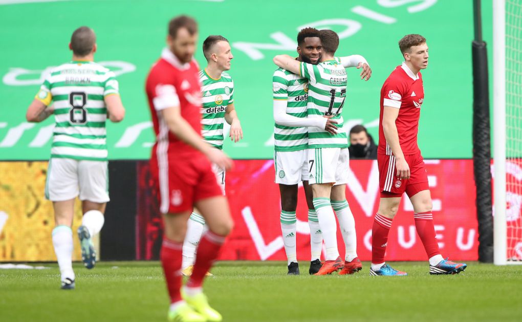 GLASGOW, SCOTLAND - FEBRUARY 27: Odsonne Edouard of Celtic celebrates with teammate Ryan Christie after scoring his team's first goal during the Ladbrokes Scottish Premiership match between Celtic and Aberdeen at Celtic Park on February 27, 2021 in Glasgow, Scotland. Sporting stadiums around the UK remain under strict restrictions due to the Coronavirus Pandemic as Government social distancing laws prohibit fans inside venues resulting in games being played behind closed doors. (Photo by Ian MacNicol/Getty Images)