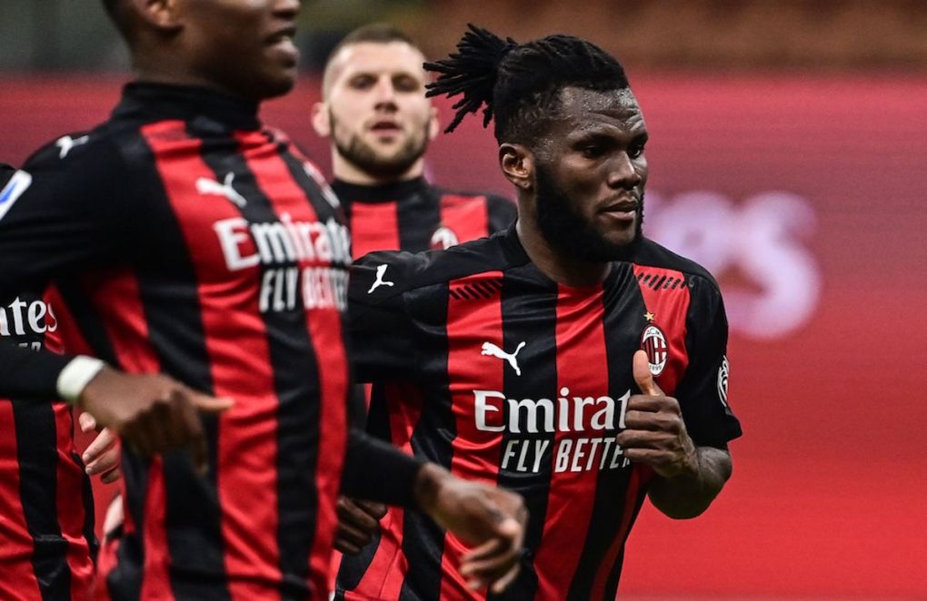 AC Milan's Ivorian midfielder Franck Kessie (R) celebrates after scoring a last minute penalty during the Italian Serie A football match AC Milan vs Udinese on March 03, 2021 at the San Siro stadium in Milan. (Photo by MIGUEL MEDINA / AFP) (Photo by MIGUEL MEDINA/AFP via Getty Images)