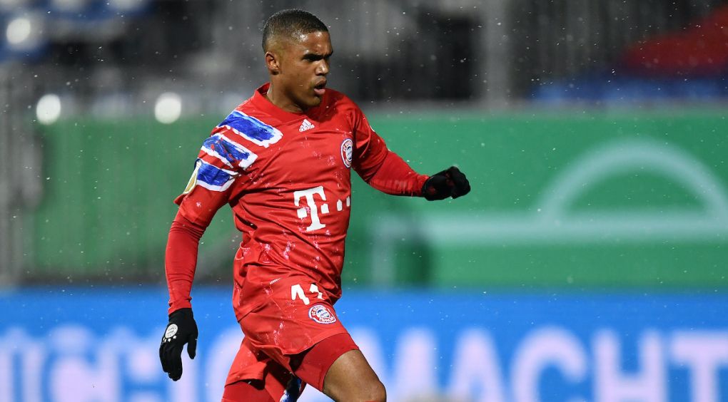 KIEL, GERMANY - JANUARY 13: Douglas Costa of Muenchen in actionduring the DFB Cup second round match between Holstein Kiel and Bayern Muenchen at Wunderino Arena on January 13, 2021 in Kiel, Germany. (Photo by Stuart Franklin/Getty Images)