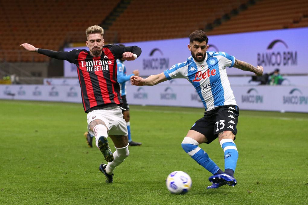 Samuel Castillejo of AC Milan attempts to block a cross from Elseid Hysaj of SSC Napoli during the Serie A match at Giuseppe Meazza, Milan. Picture date: 14th March 2021. Picture credit should read: Jonathan Moscrop/Sportimage PUBLICATIONxNOTxINxUK SPI-0955-0104
