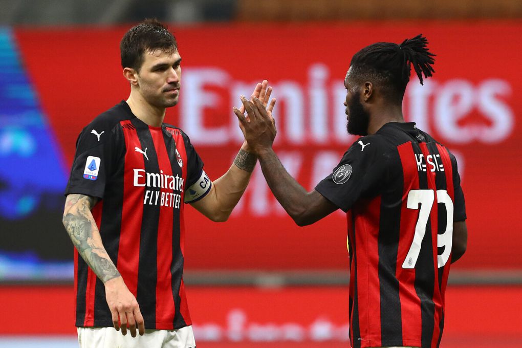 MILAN, ITALY - MARCH 03: Franck Kessie of Milan celebrates with teammate Jens Petter Hauge after scoring their team's first goal during the Serie A match between AC Milan and Udinese Calcio at Stadio Giuseppe Meazza on March 03, 2021 in Milan, Italy. Sporting stadiums around Italy remain under strict restrictions due to the Coronavirus Pandemic as Government social distancing laws prohibit fans inside venues resulting in games being played behind closed doors. (Photo by Marco Luzzani/Getty Images)