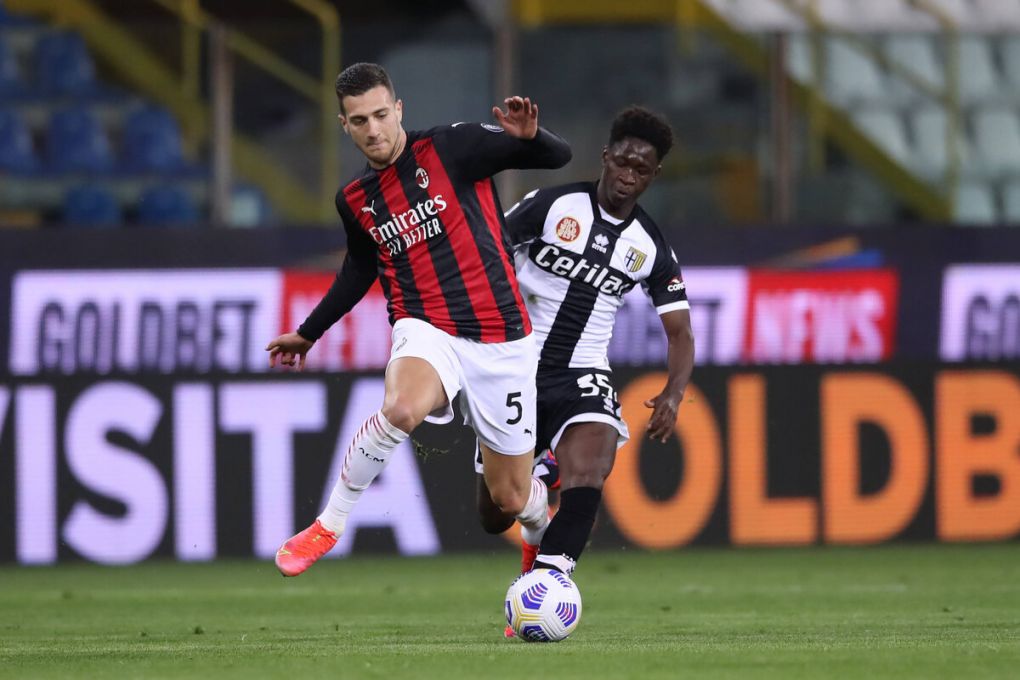 Parma, Italy, 10th April 2021. Diogo Dalot of AC Milan takes on Chaka Traore of Parma Calcio during the Serie A match at Stadio Ennio Tardini, Parma. Picture credit should read: Jonathan Moscrop / Sportimage PUBLICATIONxNOTxINxUK SPI-0993-0061