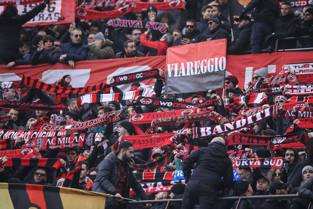AC Milan fans wave flags and hold up scarves during the Serie A match at Giuseppe Meazza, Milan. Picture date: 19th January 2020. Picture credit should read: Jonathan Moscrop/Sportimage PUBLICATIONxNOTxINxUK SPI-0444-0170