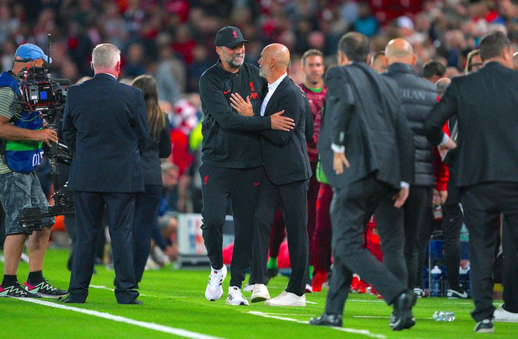 Liverpool manager Jurgen Klopp greets AC Milan manager Stefano Pioli