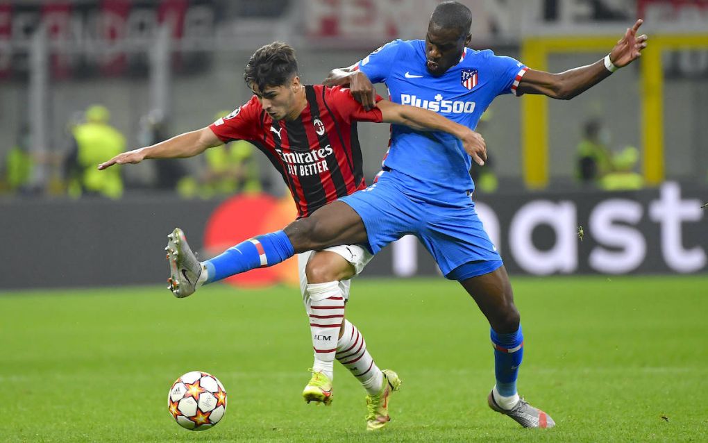 Brahim Diaz of AC Milan and Geoffrey Kondogbia of Atletico Madrid compete for the ball during the Uefa Champions League