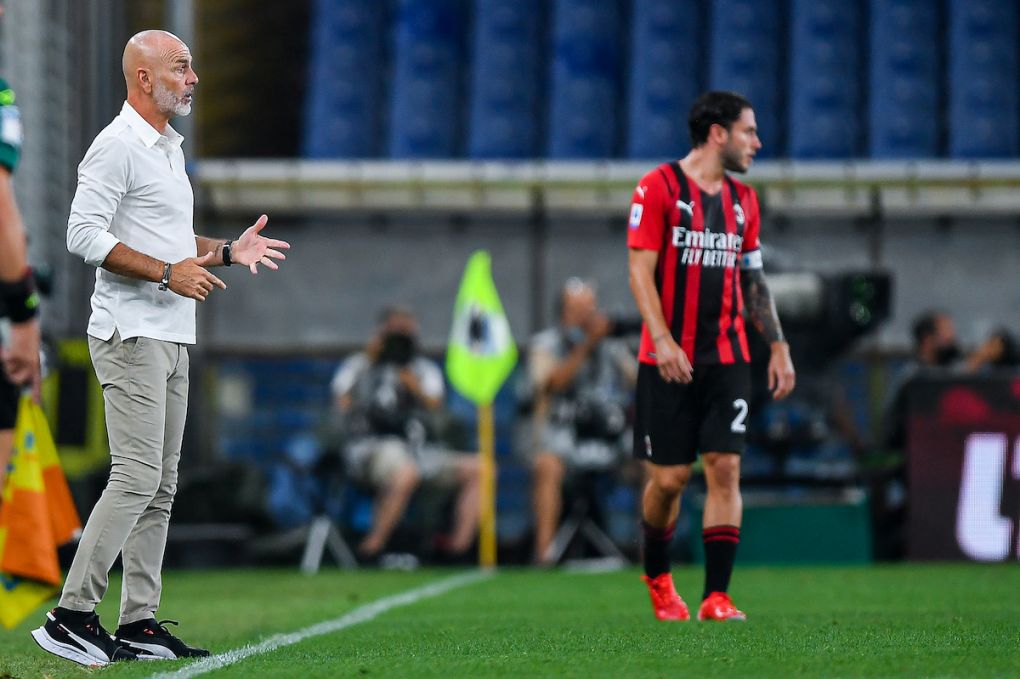 Stefano Pioli head coach of Milan (L) and Davide Calabria