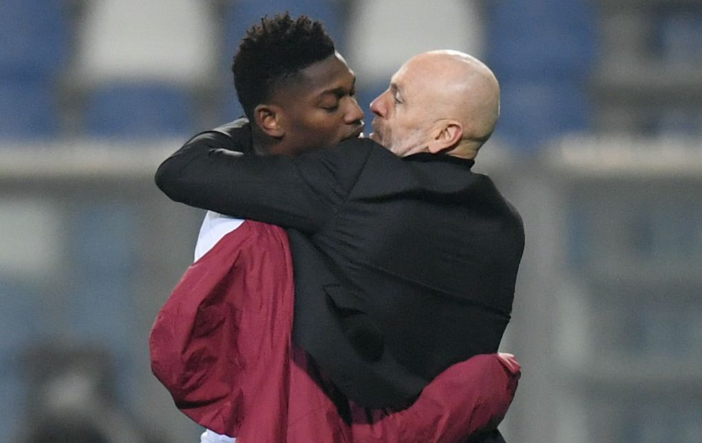 Stefano Pioli, manager of AC Milan celebrates victory with Rafael Leao