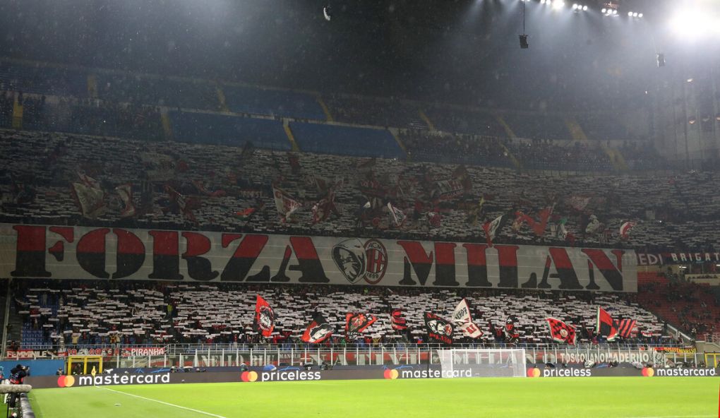 MILAN, ITALY - NOVEMBER 03: Fans of AC Milan show their support prior to the UEFA Champions League group B match between AC Milan and FC Porto at Giuseppe Meazza Stadium on November 03, 2021 in Milan, Italy. (Photo by Marco Luzzani/Getty Images)