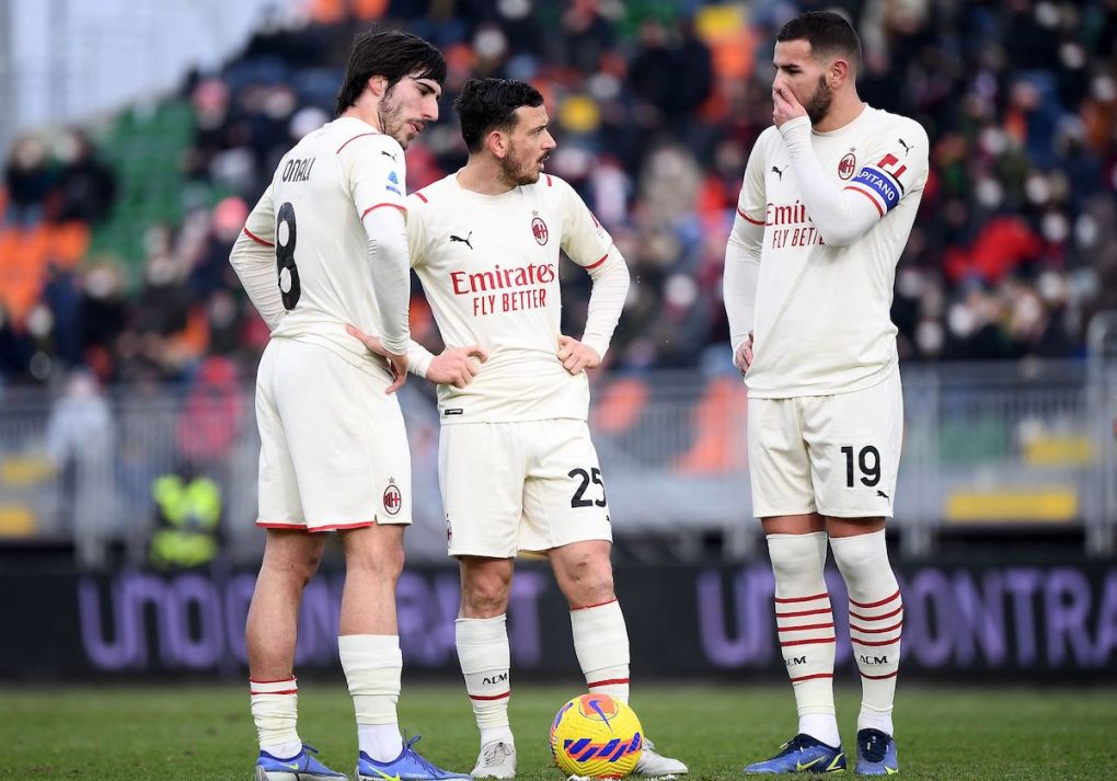 AC Milan's Italian midfielder Alessandro Florenzi (C) reacts next to AC Milan's French defender Theo Hernandez (R) and AC Milan's Italian midfielder Sandro Tonali