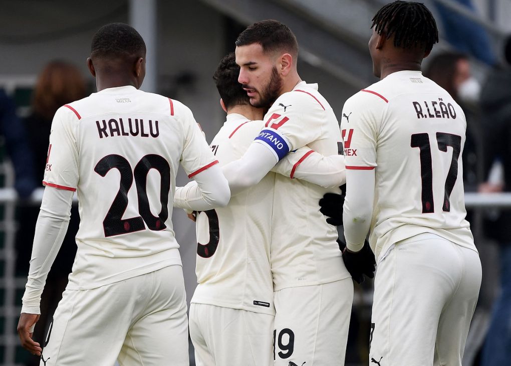 AC Milan's French defender Theo Hernandez (C) celebrates with teammates after scoring during the Serie A football match beetween Venezia and AC Milan at the Pier Luigi Penso stadium in Venice on January 9, 2022. (Photo by Marco BERTORELLO / AFP) (Photo by MARCO BERTORELLO/AFP via Getty Images)