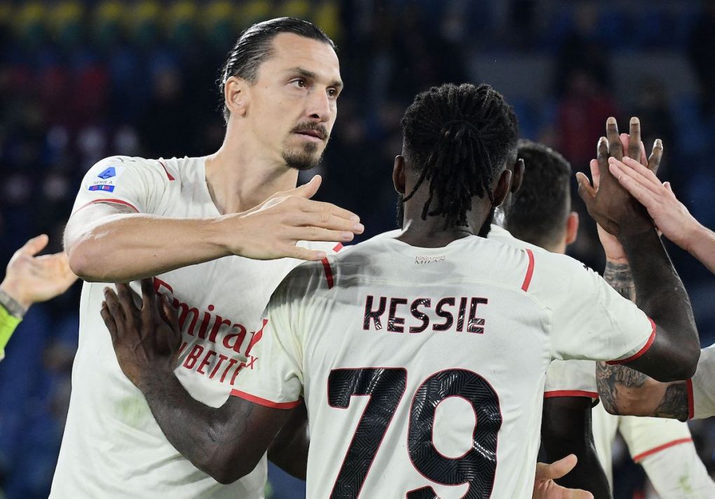 AC Milan's Swedish forward Zlatan Ibrahimovic (C) congratulates AC Milan's Ivorian midfielder Franck Kessie