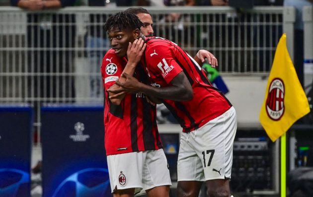AC Milan's Portuguese forward Rafael Leao (R) celebrates with AC Milan's Algerian midfielder Ismael Bennace