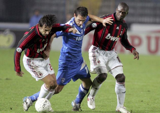 Andrea Pirlo (L) and Clarence Seedorf (R) of AC Milan
