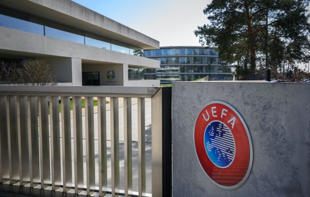 A picture taken in Nyon on March 17, 2020 shows the gate at the headquarters of UEFA