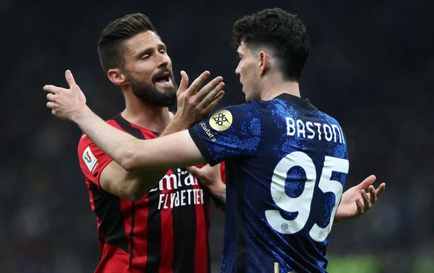 Olivier Giroud of AC Milan disputes with Alessandro Bastoni of FC Internazionale