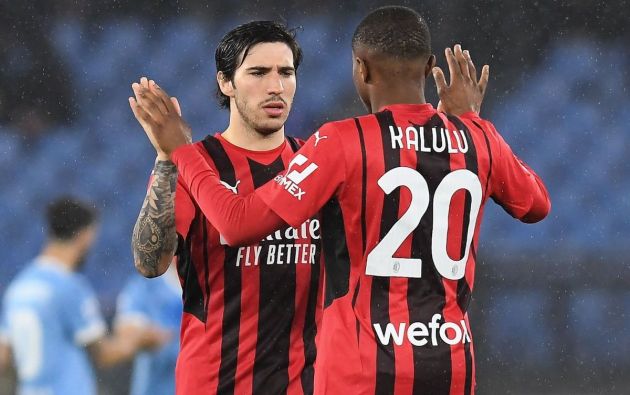 Sandro Tonali of AC Milan greets Pierre Kalulu