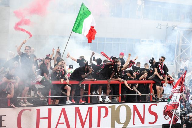 AC Milan players parade with the Scudetto Trophy