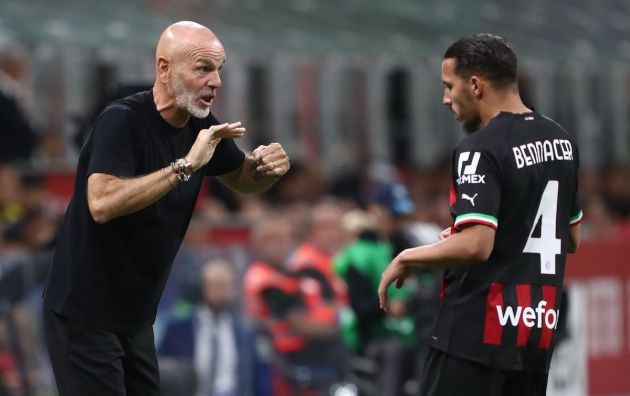 AC Milan coach Stefano Pioli issues instructions to his player Ismael Bennacer