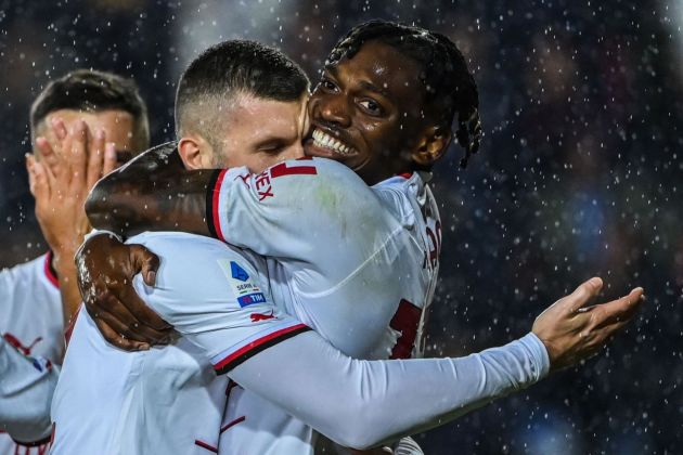 AC Milan's Croatian forward Ante Rebic (L) celebrates with AC Milan's Portuguese forward Rafael Leao after opening the scoring during the Italian Serie A football math between Empoli and AC Milan on October 1, 2022 at the Carlo-Castellani stadium in Empoli. (Photo by Alberto PIZZOLI / AFP) (Photo by ALBERTO PIZZOLI/AFP via Getty Images)
