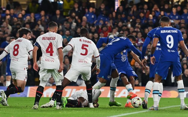 Chelsea's French defender Wesley Fofana (rear R) shoots and scores his team first goal during the UEFA Champions League Group E football match between Chelsea and AC Milan at Stamford Bridge in London on October 5, 2022. (Photo by Glyn KIRK / AFP) (Photo by GLYN KIRK/AFP via Getty Images)