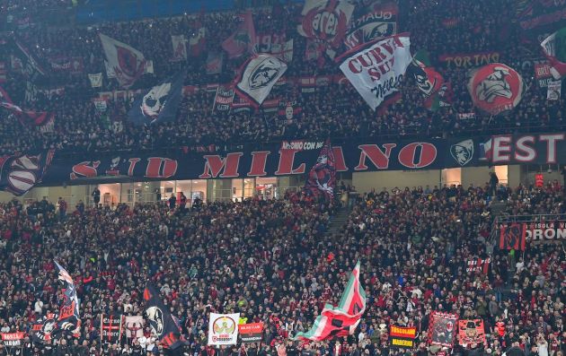 AC Milan fans cheer during the UEFA Champions League Group E football match between AC Milan and RB Salzburg on November 2, 2022 at the San Siro stadium in Milan. (Photo by MIGUEL MEDINA / AFP) (Photo by MIGUEL MEDINA/AFP via Getty Images)