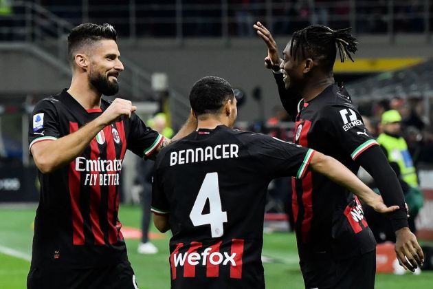 AC Milan's Portuguese forward Rafael Leao (R) celebrates with AC Milan's French forward Olivier Giroud (L) and AC Milan's Algerian defender Ismael Bennacer