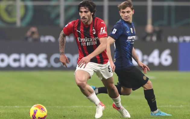 Sandro Tonali of AC Milan is challenged by Nicolo’ Barella of FC Internazionale