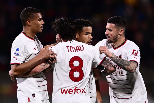 AC Milan's Brazilian forward Junior Messias (C-R) celebrates with AC Milan's Italian midfielder Sandro Tonali (C-L), AC Milan's Bosnian midfielder Rade Krunic (R) and AC Milan's German-Finnish defender Malick Thiaw after opening the scoring during the Italian Serie A football match between Monza and AC Milan on February 18, 2023 at the Brianteo stadium in Monza. (Photo by Marco BERTORELLO / AFP) (Photo by MARCO BERTORELLO/AFP via Getty Images)
