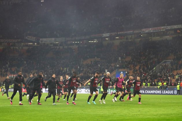 Players of AC Milan celebrate victory