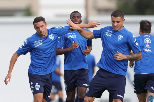 Ismael Bennacer and Rade Krunic (R) of Empoli FC