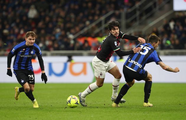 Sandro Tonali of AC Milan is challenged by Francesco Acerbi of FC Internazionale