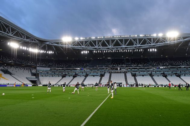 allianz stadium emptyA general view shows Juventus players warm up in an empty stadium prior to the Italian Cup (Coppa Italia) semi-final second leg football match Juventus vs AC Milan on June 12, 2020 at the Allianz stadium in Turin, the first to be played in Italy since March 9 and the lockdown aimed at curbing the spread of the COVID-19 infection, caused by the novel coronavirus. (Photo by Miguel MEDINA / AFP) (Photo by MIGUEL MEDINA/AFP via Getty Images)