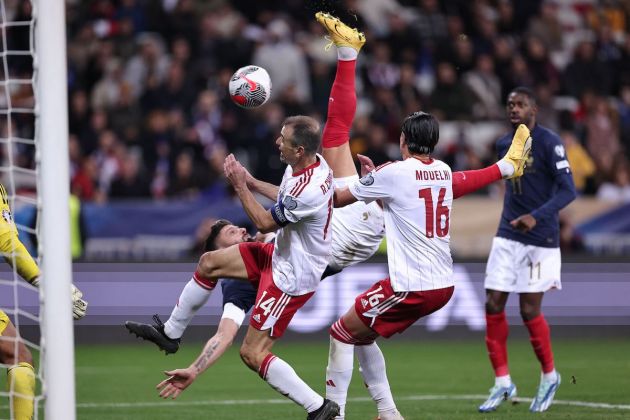 France's forward #09 Olivier Giroud performs an overhead kick