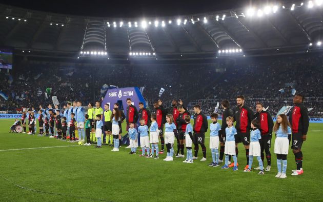 Players of SS Lazio and AC Milan line up