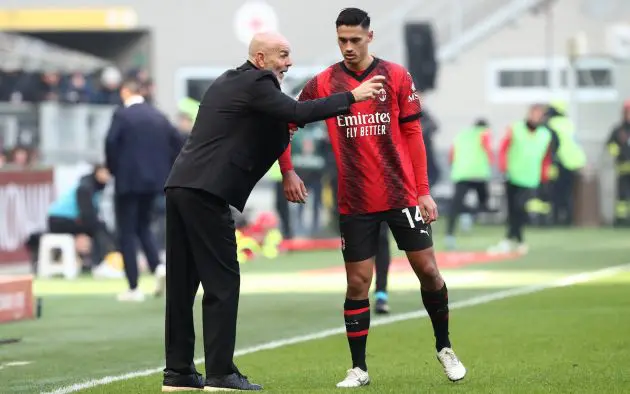 Stefano Pioli, Head Coach of AC Milan, speaks with Tijjani Reijnders of AC Milan