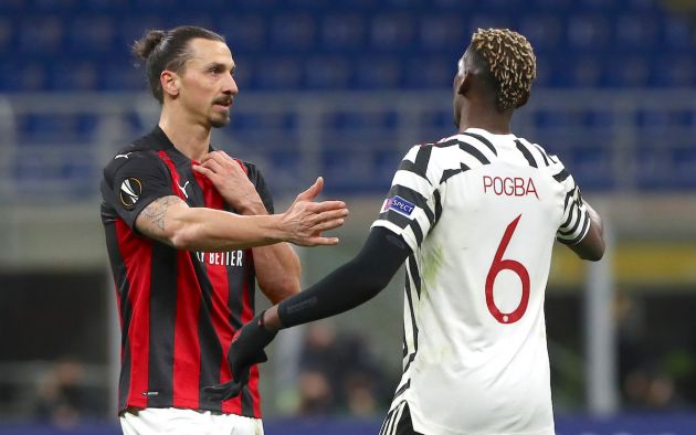 Zlatan Ibrahimovic of AC Milan interacts with Paul Pogba of Manchester United