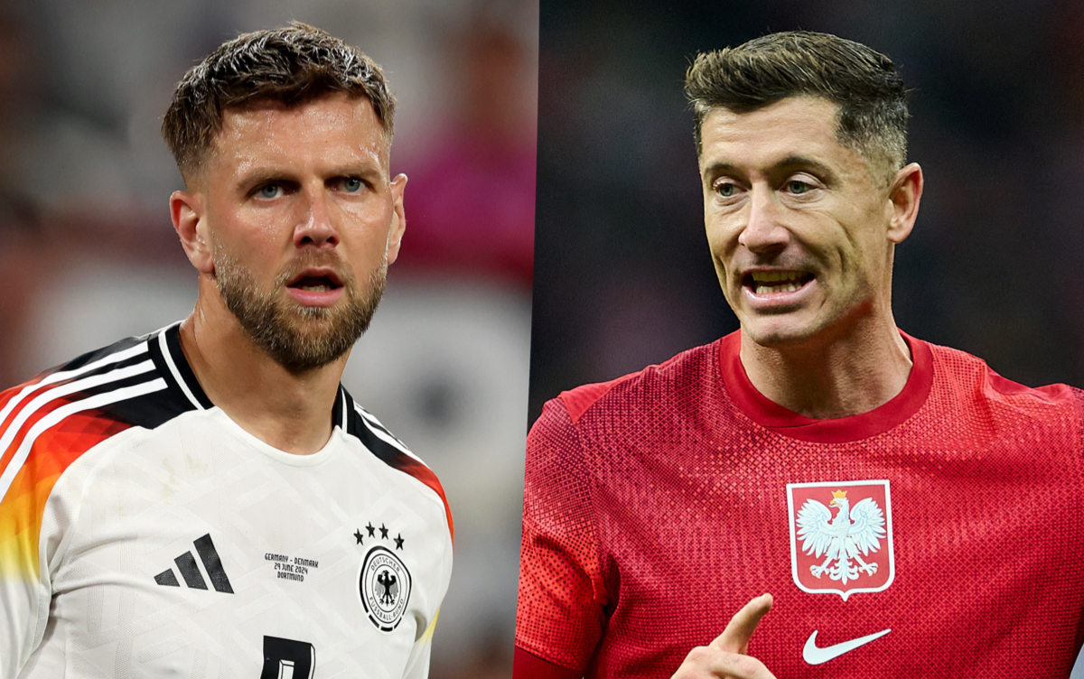 Niclas Fuellkrug of Germany, Robert Lewandowski of Poland
