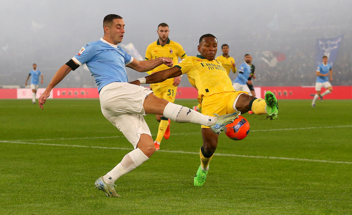 Adam Marusic of Lazio battles for possession with Pervis Estupinan of AC Milan
