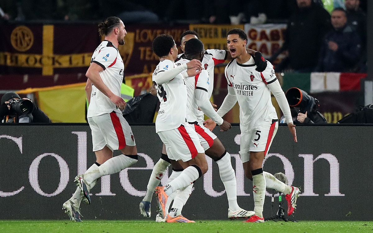 De Winter celebrates with Milan teammates