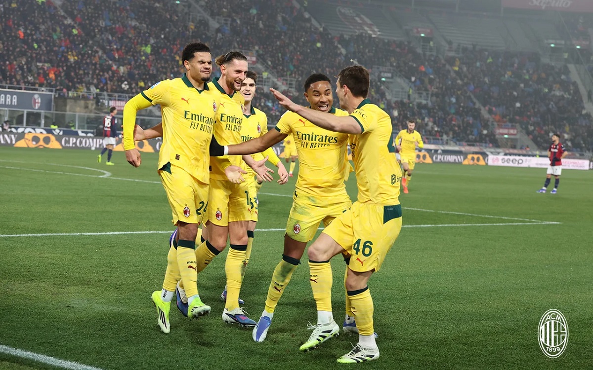 Milan players celebrate against Bologna