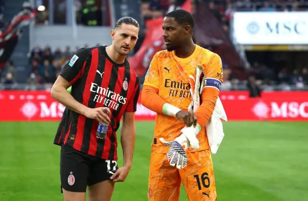 Adrien Rabiot interacts with Mike Maignan of AC Milan